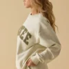 Sudadera oversize de cuello redondo en color hueso