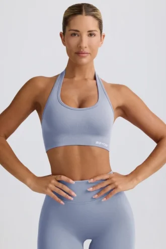 Sujetador deportivo con cuello halter Define Luxe en azul grisáceo