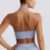 Sujetador deportivo con cuello halter Define Luxe en azul grisáceo