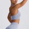 Sujetador deportivo con cuello halter Define Luxe en azul grisáceo