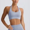 Sujetador deportivo con cuello halter Define Luxe en azul grisáceo