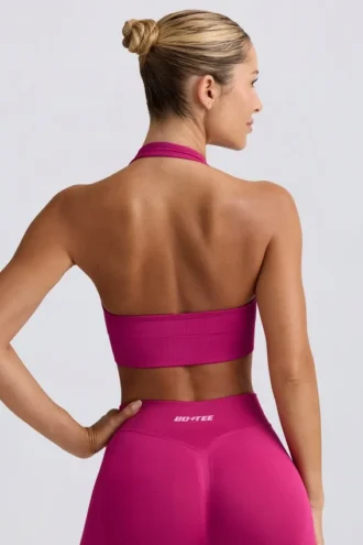 Sujetador deportivo con cuello halter Define Luxe en Berry
