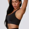 Sujetador deportivo Define Luxe con aberturas en negro