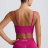 Sujetador deportivo Define Luxe con cuello en V en color Berry