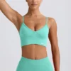 Sujetador deportivo Define Luxe con cuello en V en color menta