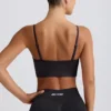 Sujetador deportivo Define Luxe con cuello en V en negro