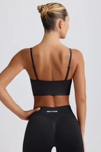 Sujetador deportivo Define Luxe con cuello en V en negro