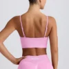 Sujetador deportivo Define Luxe con cuello en V en rosa chicle
