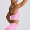 Sujetador deportivo Define Luxe con cuello en V en rosa chicle