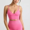 Sujetador deportivo Define Luxe con cuello en V en rosa intenso