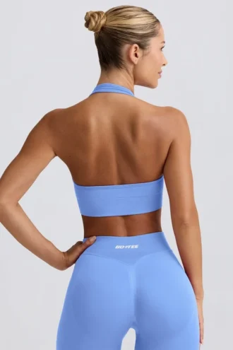Sujetador deportivo Define Luxe con cuello halter en azul claro