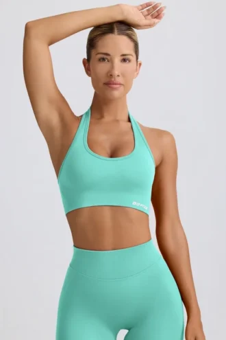 Sujetador deportivo Define Luxe con cuello halter en color menta