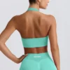 Sujetador deportivo Define Luxe con cuello halter en color menta