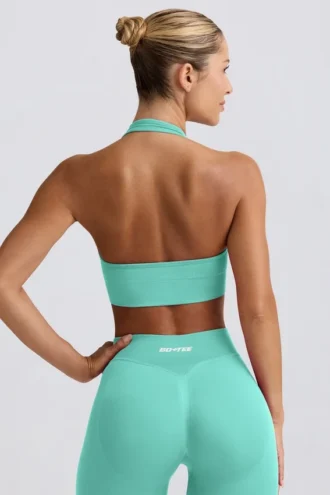 Sujetador deportivo Define Luxe con cuello halter en color menta