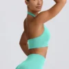 Sujetador deportivo Define Luxe con cuello halter en color menta