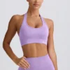 Sujetador deportivo Define Luxe con cuello halter en lila