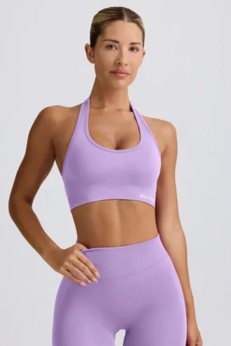 Sujetador deportivo Define Luxe con cuello halter en lila