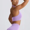 Sujetador deportivo Define Luxe con cuello halter en lila
