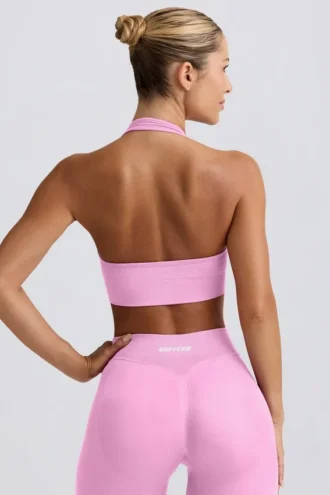 Sujetador deportivo Define Luxe con cuello halter en rosa chicle