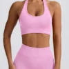 Sujetador deportivo Define Luxe con cuello halter en rosa chicle