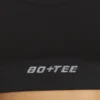 Sujetador deportivo Define Luxe con escote pronunciado en negro