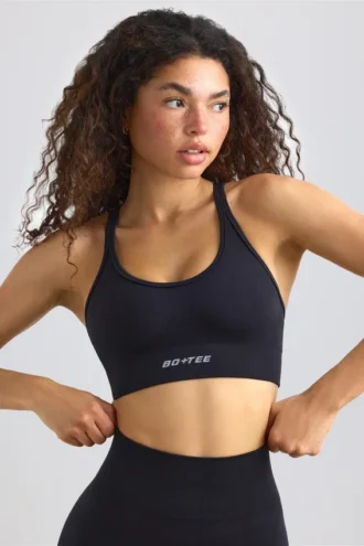 Sujetador deportivo Define Luxe con tirantes en negro