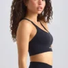 Sujetador deportivo Define Luxe con tirantes en negro