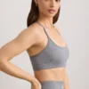 Sujetador deportivo FlexiRib con cuello redondo en gris jaspeado