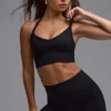 Sujetador deportivo multifuncional Define Luxe en negro