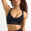 Sujetador deportivo sin costuras con espalda cruzada Super Sculpt en negro