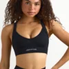 Sujetador deportivo sin costuras con espalda cruzada Super Sculpt en negro