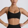 Sujetador deportivo sin costuras con espalda cruzada Super Sculpt en negro