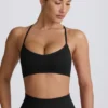 Sujetador deportivo sin costuras con espalda cruzada Super Sculpt en negro