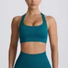 Sujetador deportivo sin costuras con espalda en T Super Sculpt en color verde azulado