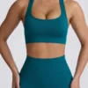 Sujetador deportivo sin costuras con espalda en T Super Sculpt en color verde azulado