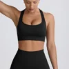 Sujetador deportivo sin costuras con espalda en T Super Sculpt en negro