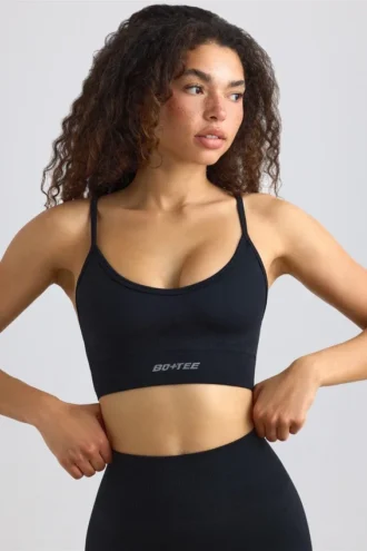 Sujetador deportivo sin costuras Super Sculpt con cuello redondo en negro