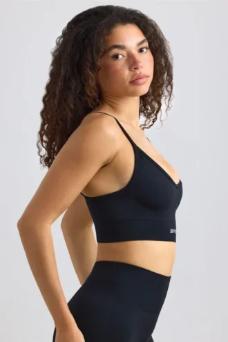 Sujetador deportivo sin costuras Super Sculpt con cuello redondo en negro