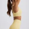 Sujetador deportivo sin costuras Super Sculpt con espalda cruzada en amarillo mantequilla