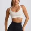 Sujetador deportivo sin costuras Super Sculpt con espalda cruzada en blanco