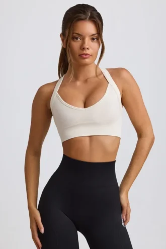 Sujetador deportivo sin costuras Super Sculpt con espalda cruzada en blanco