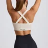 Sujetador deportivo sin costuras Super Sculpt con espalda cruzada en blanco