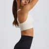 Sujetador deportivo sin costuras Super Sculpt con espalda cruzada en blanco