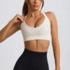 Sujetador deportivo sin costuras Super Sculpt con espalda cruzada en blanco