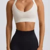 Sujetador deportivo sin costuras Super Sculpt con espalda cruzada en blanco