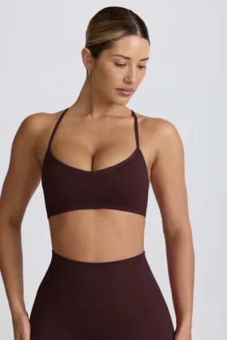 Sujetador deportivo sin costuras Super Sculpt con espalda cruzada en color chocolate