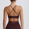 Sujetador deportivo sin costuras Super Sculpt con espalda cruzada en color chocolate