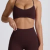 Sujetador deportivo sin costuras Super Sculpt con espalda cruzada en color chocolate