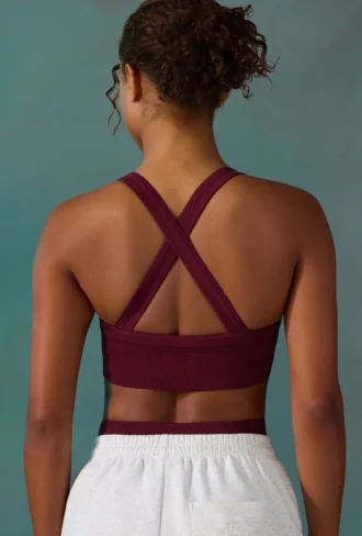 Sujetador deportivo sin costuras Super Sculpt con espalda cruzada en color ciruela