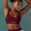 Sujetador deportivo sin costuras Super Sculpt con espalda cruzada en color ciruela